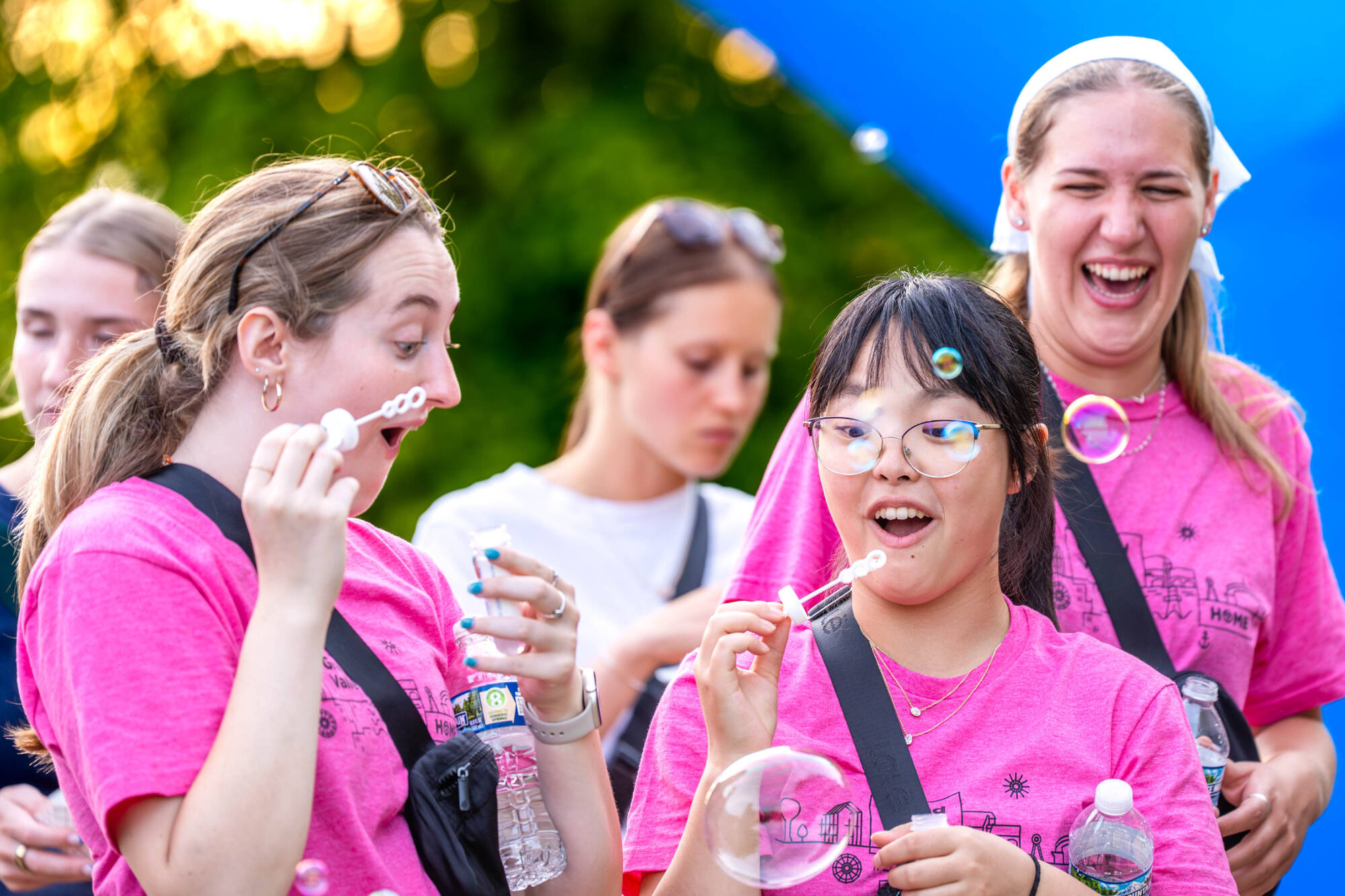 students blowing bubbles at Laker Kickoff